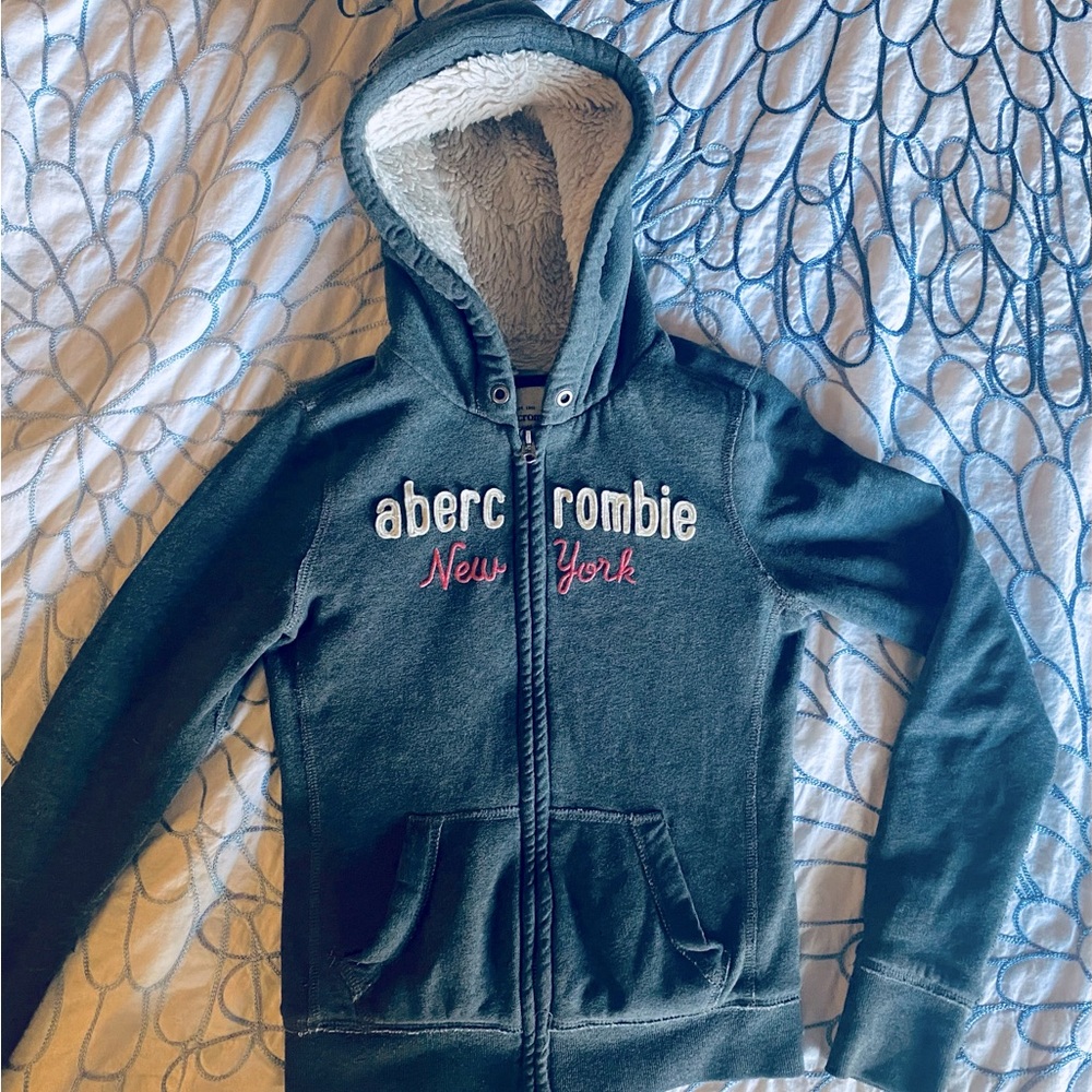 Abercrombie and Fitch faux fur lined, embroidered zip up. Very cozy and warm.